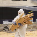 Staff with Protective Gear Basketball Court Large Water Damage Restoration