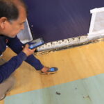 Staff Reading High Water content in Gym flooring