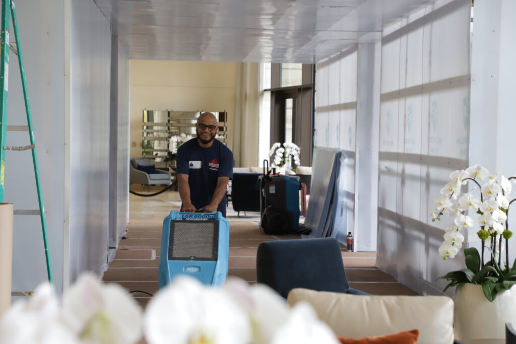 Technician at Century City Hi-rise Tower Lobby Water Mitigation