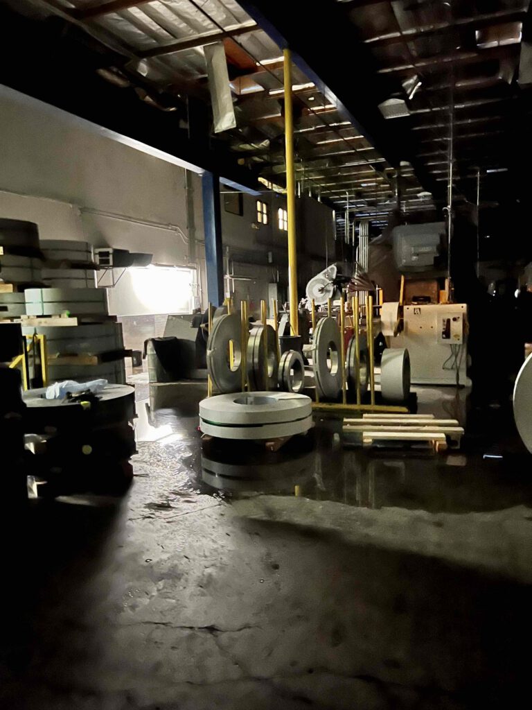 Industrial Building with Storm Water Damage Roof Leak - Pacoima